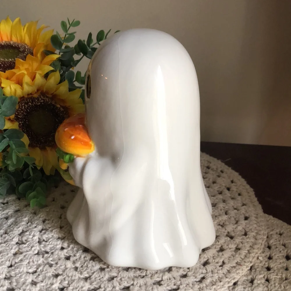 White Ceramic Ghost Figurine Holding Burger